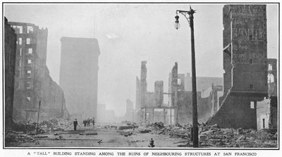 A tall building standing among the ruins of neighbouring structures after the 1906 San Francisco earthquake, 1906 by American Photographer